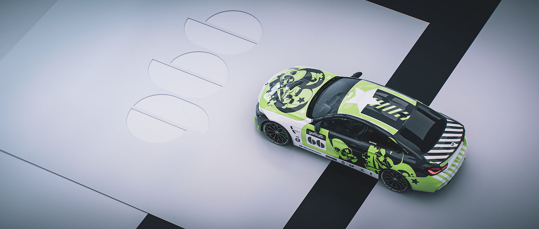 A bird's-eye view render of the custom BMW M4 on a white studio floor featuring large embossed branding graphics, highlighting the star motif and graphic treatment on the car's roof and bonnet.