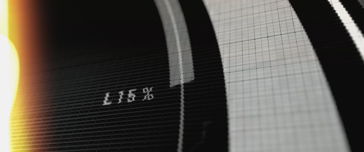 An abstract macro style frame focusing on a fine technical UI grid, digital data readouts, and a bright anamorphic lens flare on the left edge.