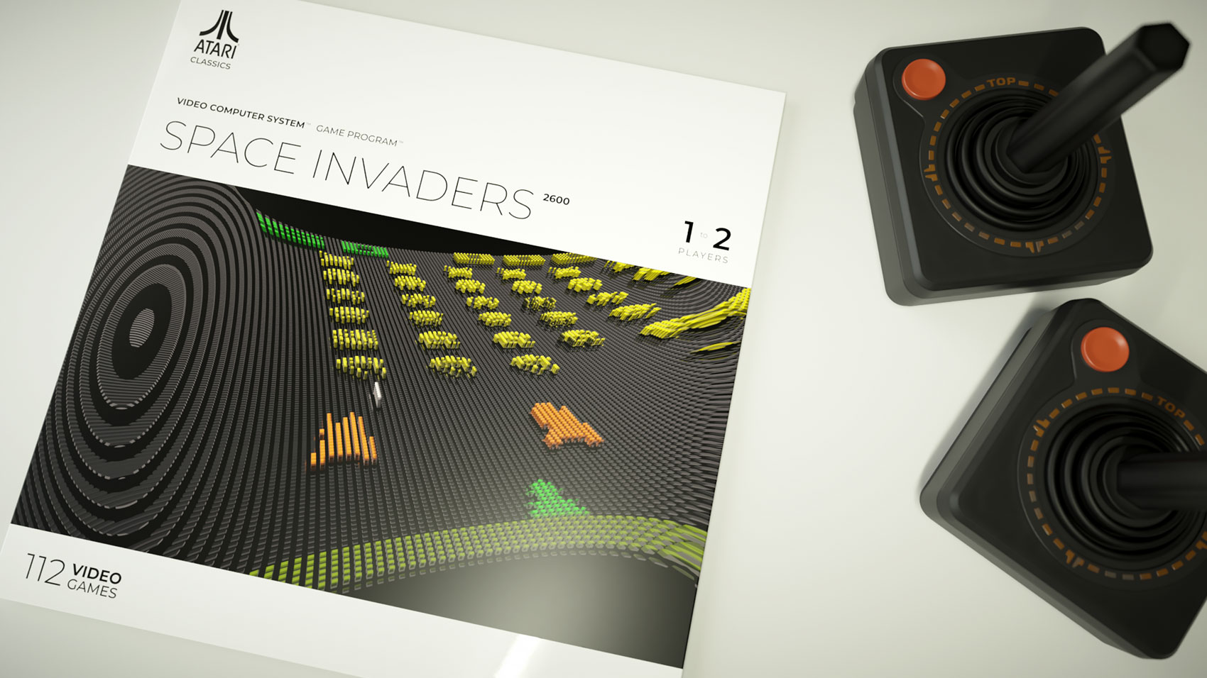 An overhead studio layout showing the custom graphic sleeve for Space Invaders, featuring an array of yellow and orange voxel alien invaders marching across a curved black grid, positioned next to two rendered Atari joystick controllers.