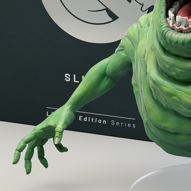 A detailed view of the 3D-printed concept figure focusing on Slimer's outstretched green arm, hand, and fingers with a shallow depth of field.