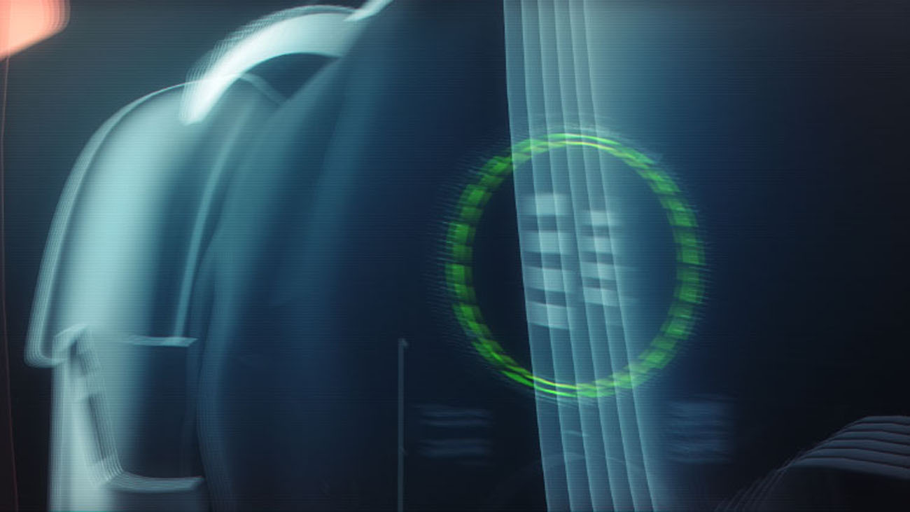 An extreme macro shallow depth of field shot focusing on a Stormtrooper's shoulder curve, overlaid with a bright green circular target reticle and fine digital graphic scanning lines.