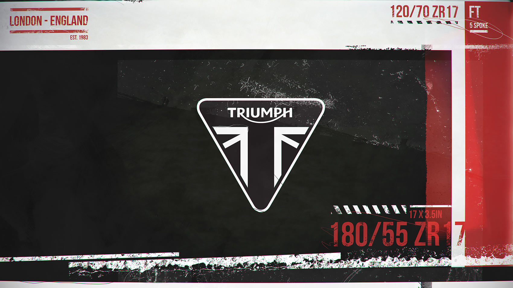 A dark, textured motion design style frame featuring the Triumph shield logo in the centre, overlaid with red and white technical typography, tyre specifications, and 'London - England' graphics.