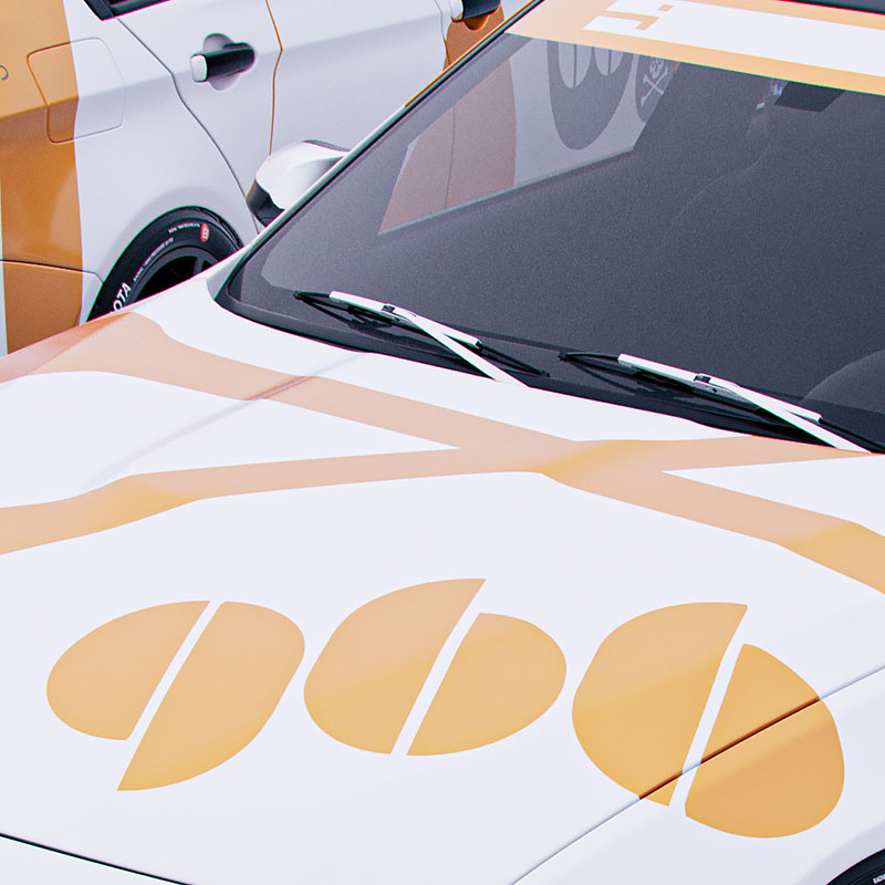 A close-up camera perspective tracking across the front hood of a vehicle, highlighting the crisp layout of large orange logo graphics against a solid white surface.