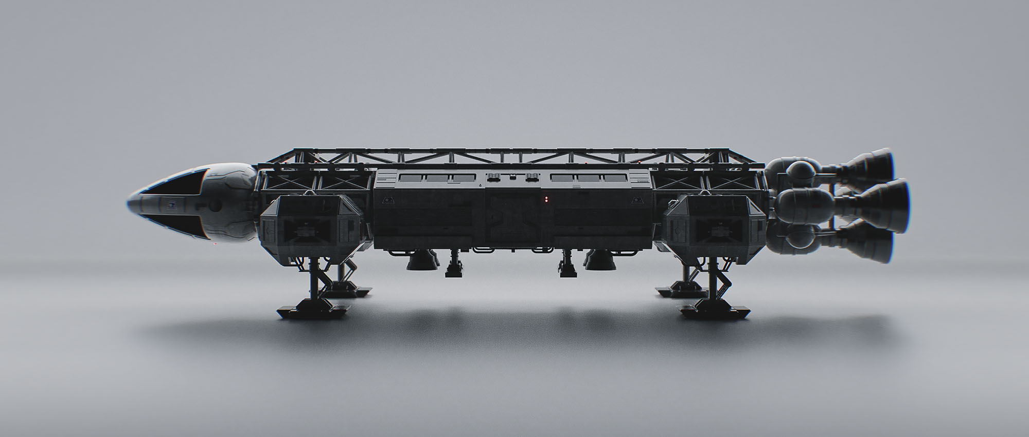 A clean, hard-surface studio profile render of a dark grey iteration of the Eagle Transporter, highlighting the mechanical undercarriage, landing gear alignment, and structural lattice detailing against a soft, light grey gradient background.