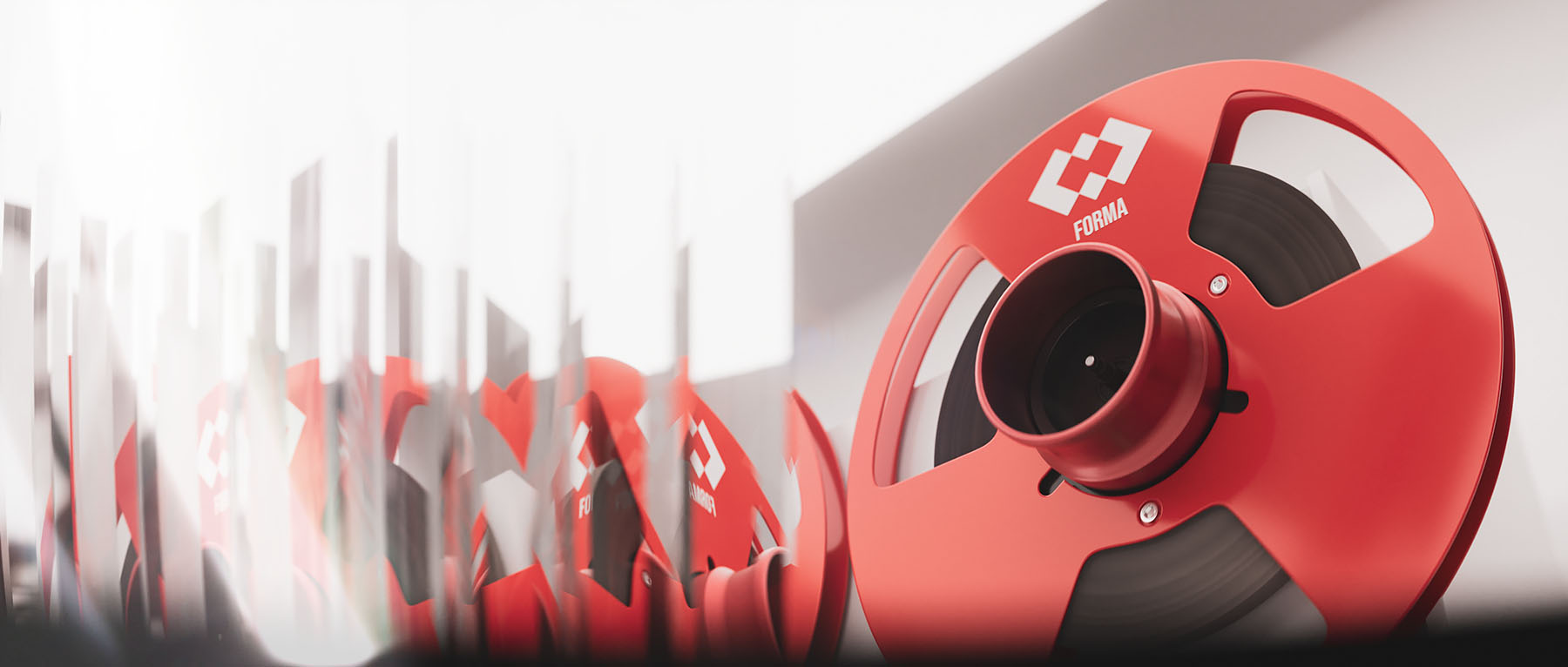 A dynamic conceptual render repeating the aluminum red tape reel pattern across the left side of the frame with a strong focal point on the main foreground hub.