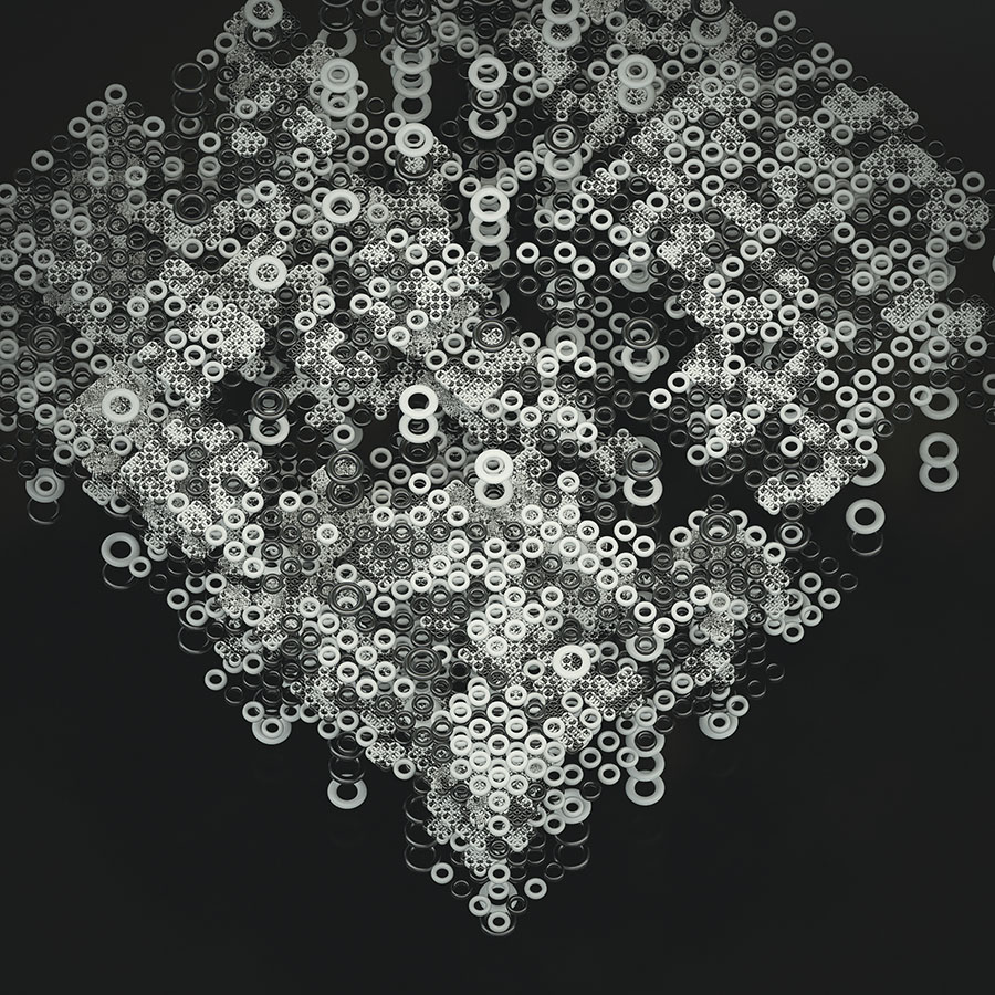 A grid of 3D rings, black and white. Rendered in Octane.
